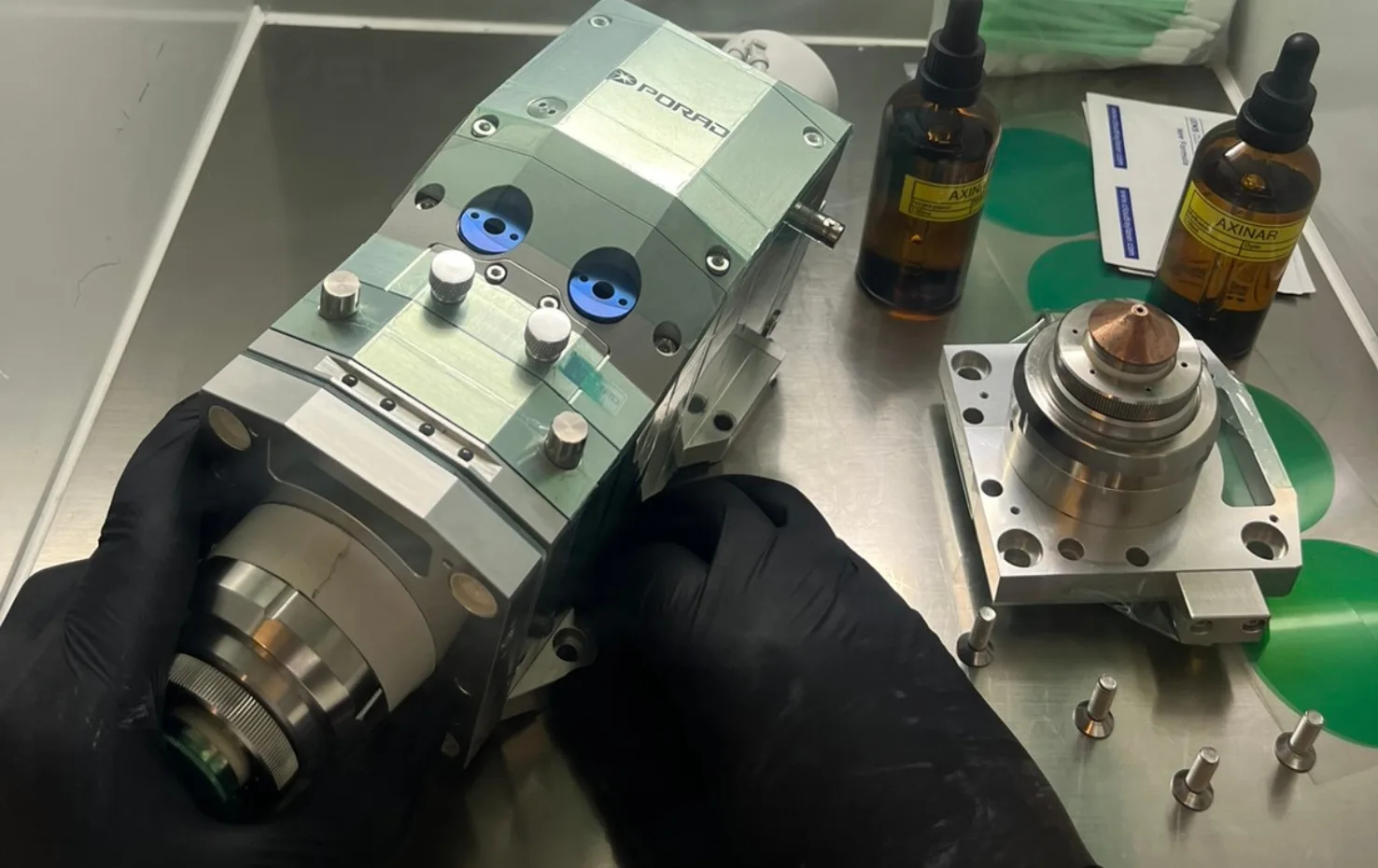 Precision assembly of high-tech components during Axinar’s cleanroom training session